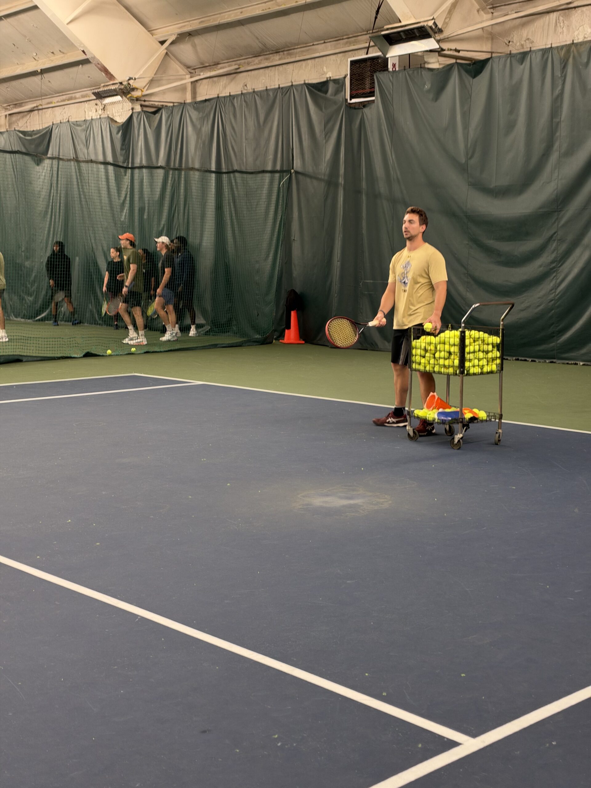 Jake leading the clinic from the indoor court at Twin Lakes